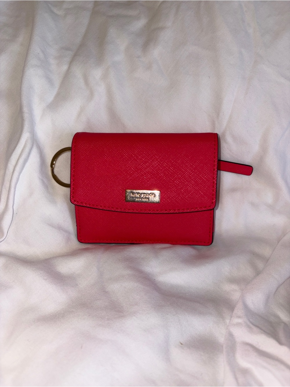 kate spade pink mini wallet with gold ring detail